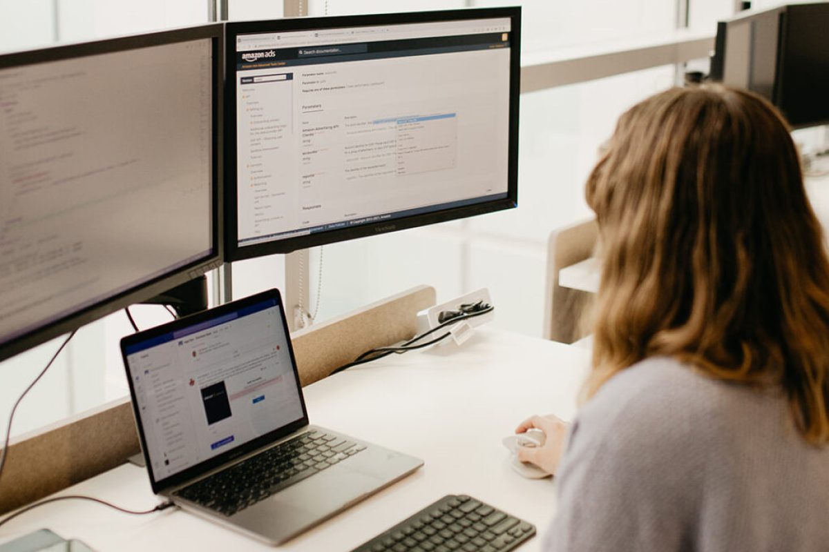 Advertising-Page-Girl-Looking-At-Computer-1022x1024